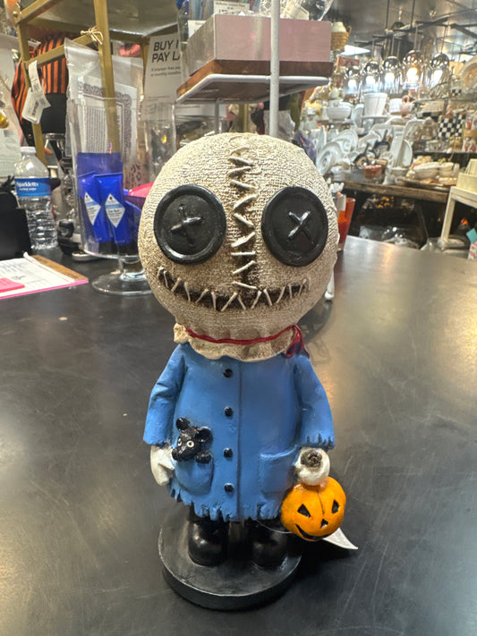 Kid with Zombie Head Figure