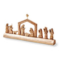 Nativity Scene On Carved Wood Log